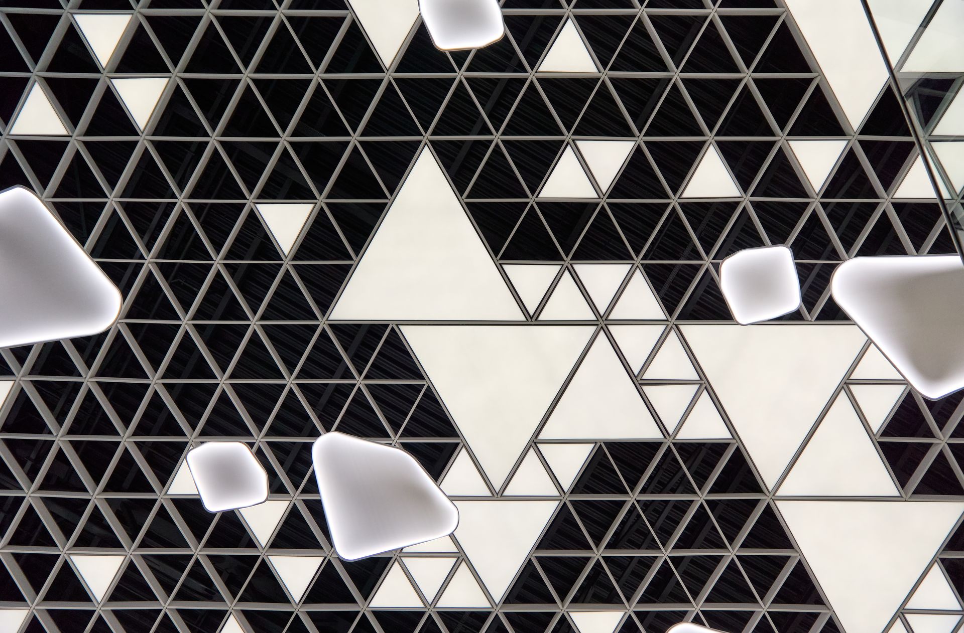 Detail of the interior ceiling with a black-and-white triangular pattern, Arena Mall Bacău