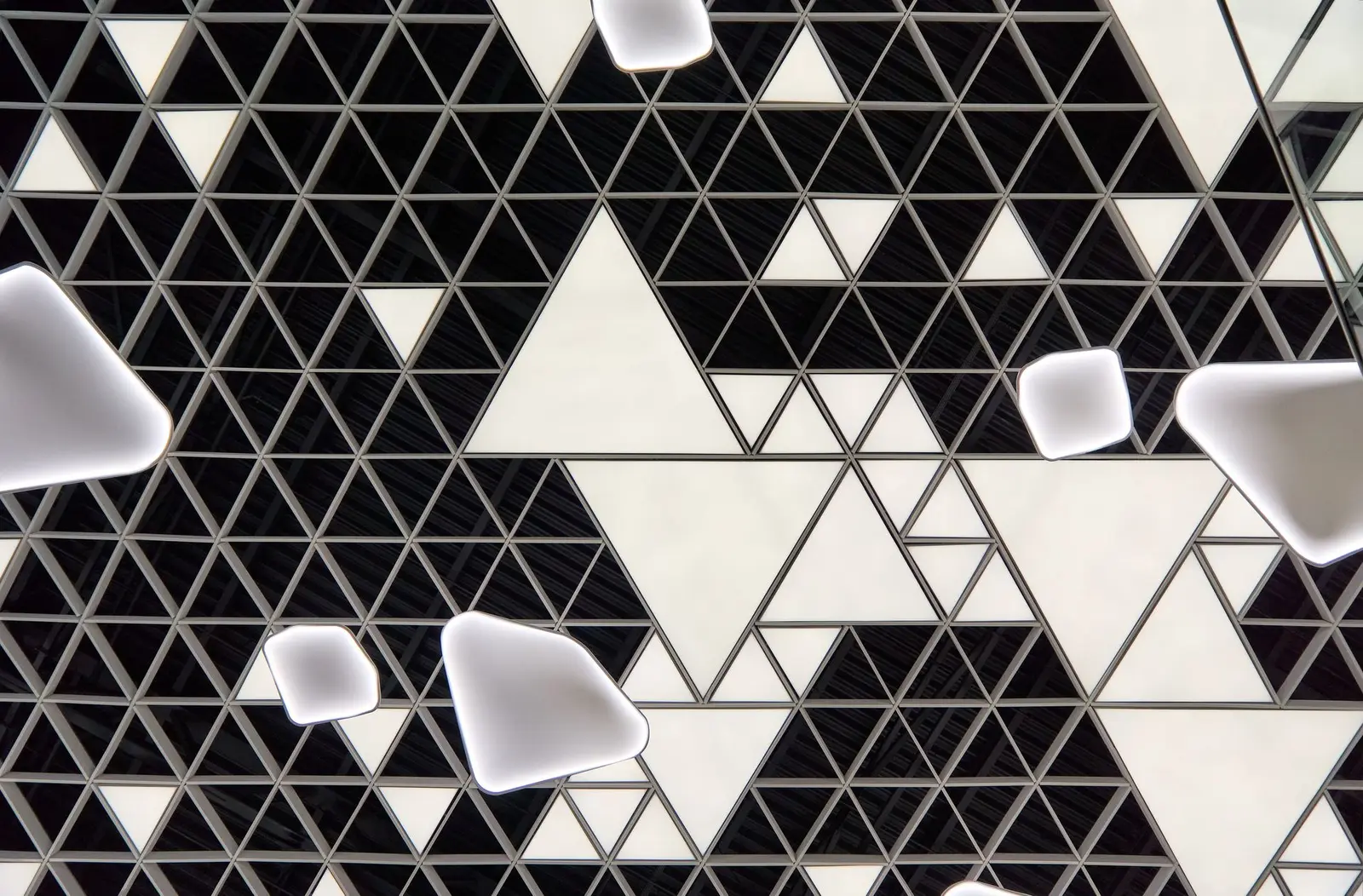 Detail of the interior ceiling with a black-and-white triangular pattern, Arena Mall Bacău