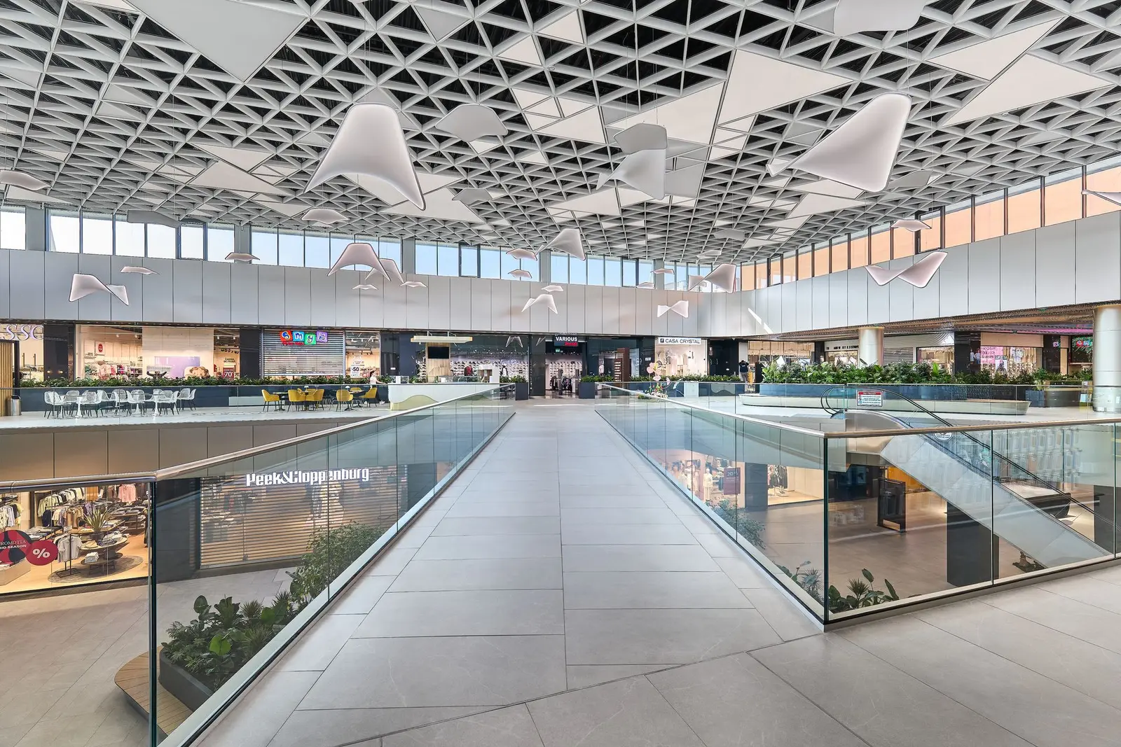 Interior atrium with multi-level galleries and glass balustrades, Arena Mall Bacău