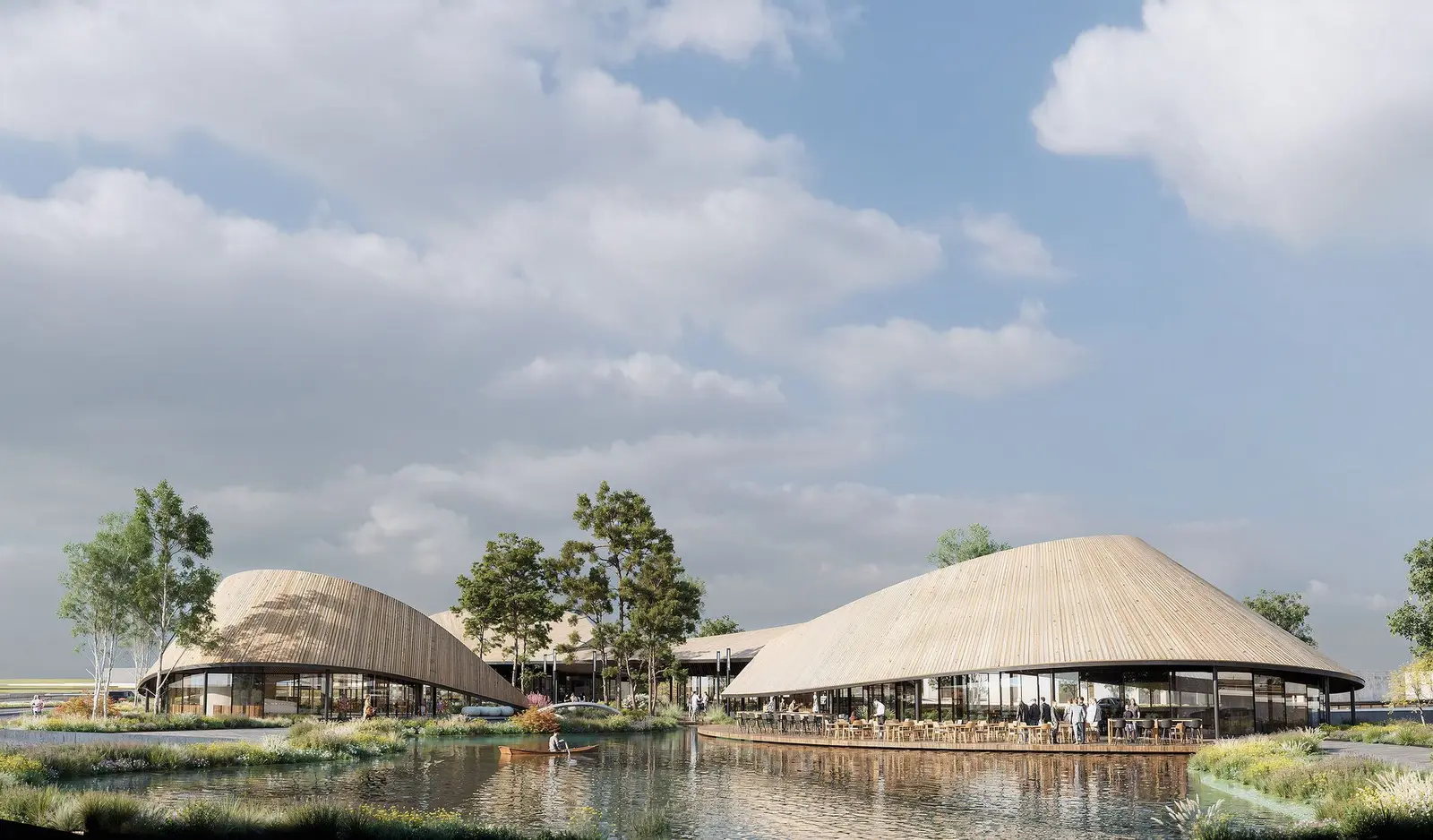 Aerial view of the scheme, with the organic pavilions, the water channel and the pedestrian promenades